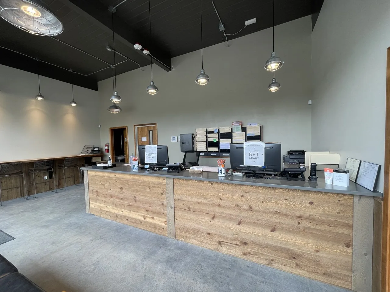 Reception area with wood-front service counter.